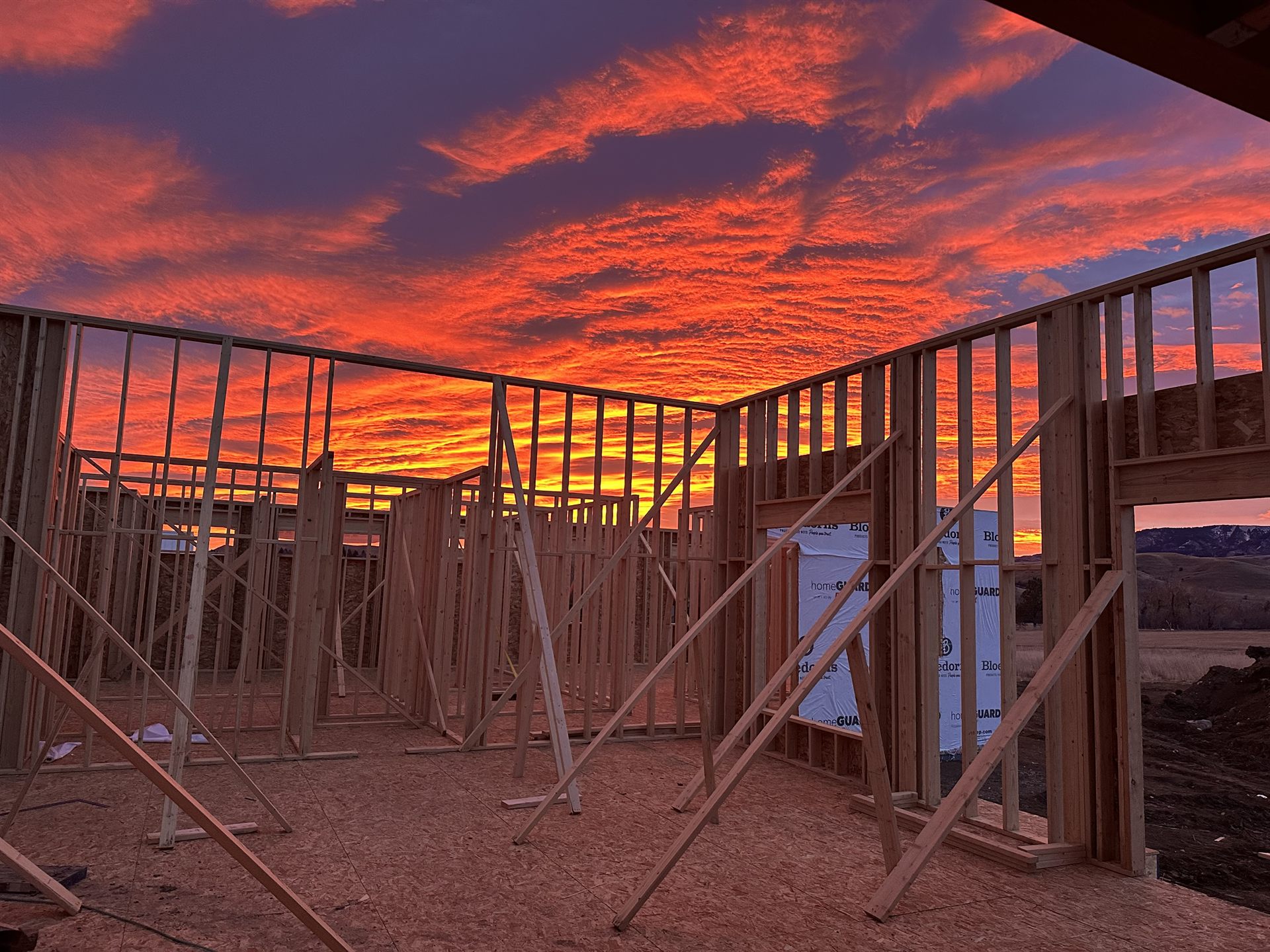 Home framing at sunset — Build It Brothers